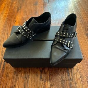 Diesel black gold studded loafers with buckles and pointed toe detail